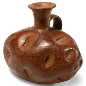 Pre-Columbian Dimpled Terracotta Jar with Handle