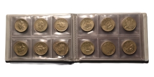 Coin Collectors Album with Elizabeth II Two Pounds Coins.