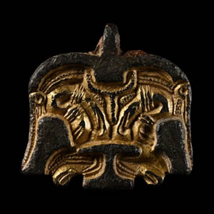 Anglo-Saxon Gilt Bronze Chip-Carved Mount with Face