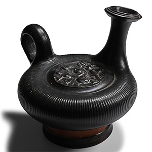 Greek Black-Glazed Guttos with Horseman Spearing an Amazon