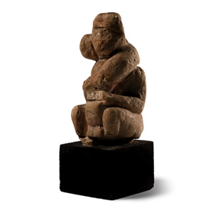 Romano-Egyptian Limestone Figure of a Seated Male with Gigantic Phallus