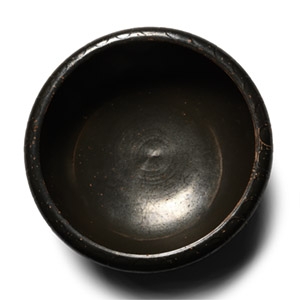 Greek Black-Glazed Terracotta Bowl with Stamped Decoration
