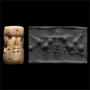 Early Akkadian Shell Cylinder Seal with Attacking Lions