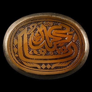 Large Western Asiatic Silver-Coloured Metal Ring with Calligraphic Gemstone