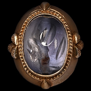 Large Gold-Coloured Metal Ring with Ancient Sapphire Bead