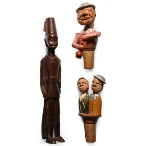 Wooden Figure and Articulated Figural Bottle Stop Group