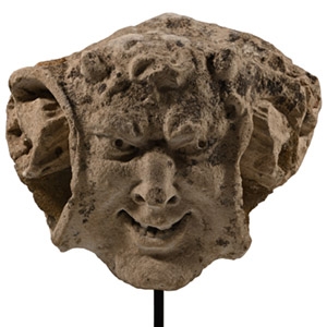 Medieval Limestone Gargoyle of a Smiling Horned Devil