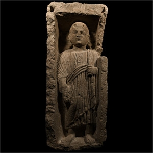 Romano-Egyptian Limestone Stele of a Nobleman Holding an Offering to the Gods