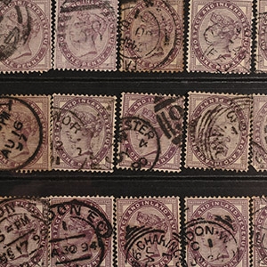 Queen Victoria One Penny Violet Stamp Group.