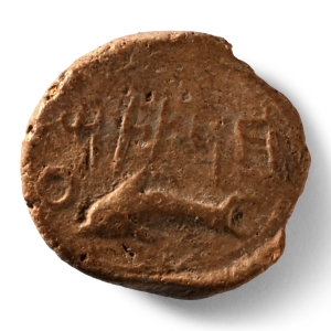 Phoenician Terracotta Bulla with a Dolphin