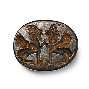 Phoenicio-Egyptian Black Stone Scaraboid with Lions