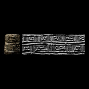 Early Syrian Black Stone Cylinder Seal with Animals