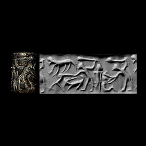 Anatolian Black Stone Cylinder Seal with Figures Holding Clubs