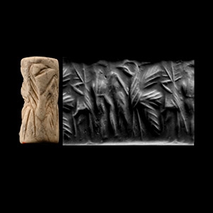 Syrian Grey Stone Cylinder Seal with Figure Holding Fish
