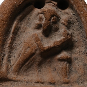 Western Asiatic Terracotta Mount with Beast