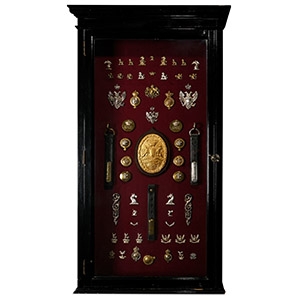 Wall Cabinet Containing a Queen Charlotte (1744-1818) Carriage Plate