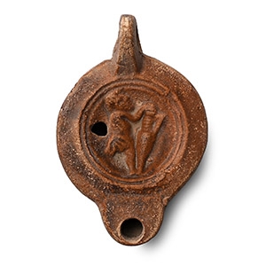 Roman Terracotta Oil Lamp with Slave Holding an Amphora