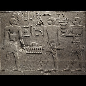 Egyptian Limestone Bas-Relief Panel of Ptah Presiding Over the Smelting of Metals