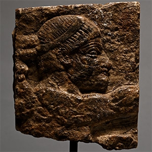 Assyrian Gypsum Relief with Head of a Bearded Man