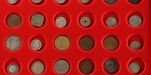 Group of Forty-Eight [48] World Coins in Lindner Tray.