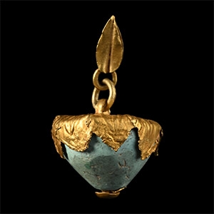 Large Western Asiatic Gold Framed Turquoise Bead