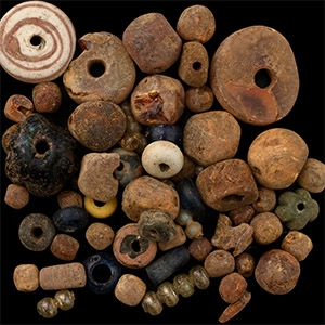 Anglo-Saxon Glass and Amber Necklace Bead Group.