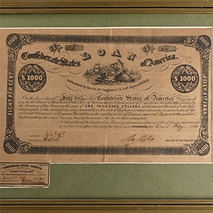 United States of America. Framed Confederate 1,000 Dollar Bond and Interest Coupon.