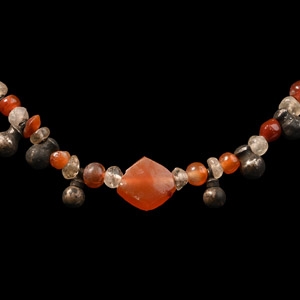 Western Asiatic Silver and Stone Bead Group