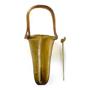 Roman Amber Glass Double Unguentarium with Dolphin-Headed Pin