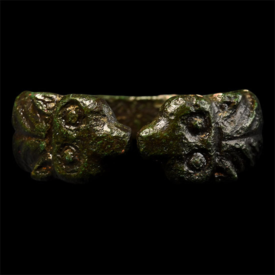 Pre-Viking Period Bronze Ring with Wolf Heads