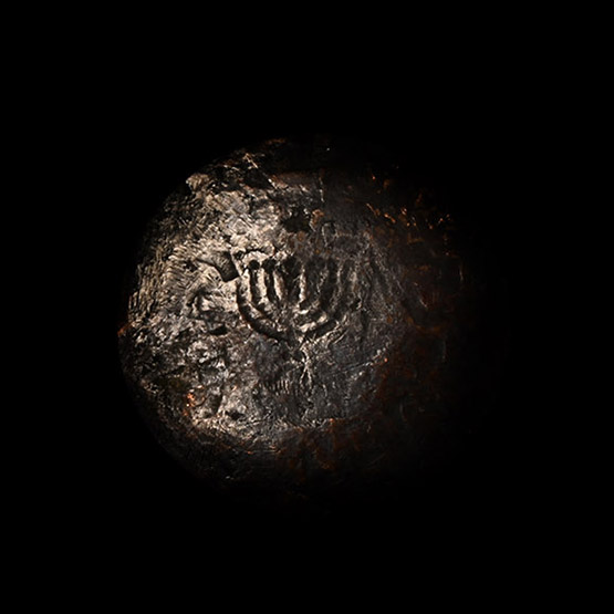 Byzantine Bronze Punch with Menorah and Hebrew Inscription