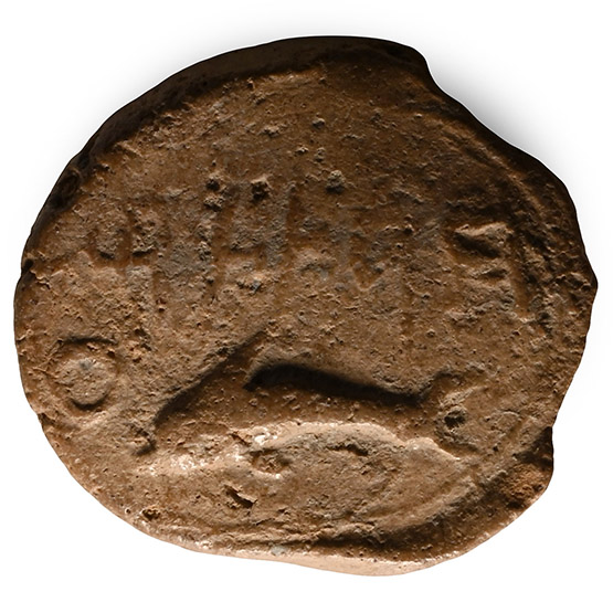 Phoenician Terracotta Bulla with a Dolphin