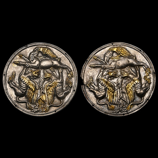 Greek Silver-Gilt Phalerae Depicting a Fight Between Gryphons, an Eagle and a Deer