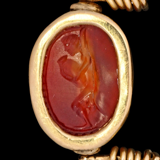 Italic Carnelian Scarab with Satyr Mounted in a Gold Swivel Ring