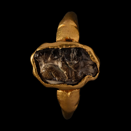 Roman Gold Ring with Burnt Agate Cameo of Eros, the Greek God of Love Riding a Hippocampus