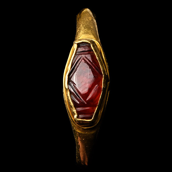 Gold Ring with Elliptical Garnet