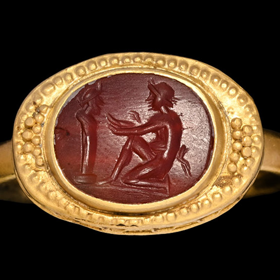 Roman Carnelian Gemstone with Kneeling Satyr Before Herm in Gold Ring