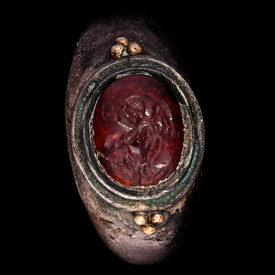 Eastern Roman Silver Ring with Garnet Cabochon with Eros and Goat