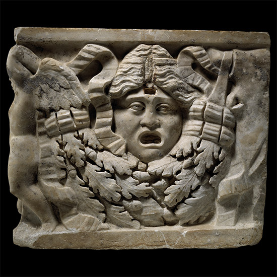 Large Roman Marble Garland Sarcophagus Panel with Theatrical Mask and Eros, the Greek God of Love