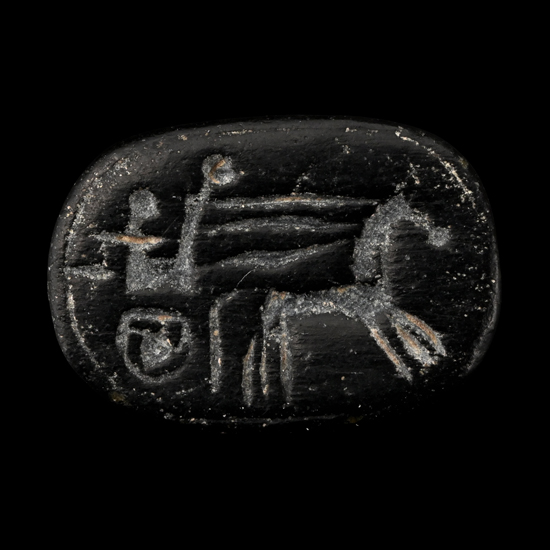 Western Asiatic Black Stone Scaraboid with Charioteer