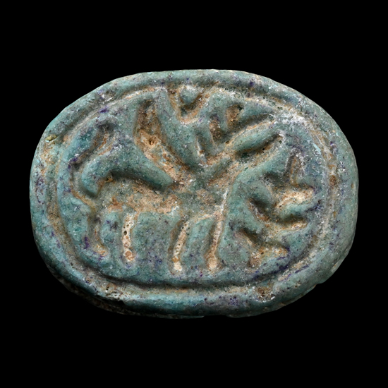 Phoenician Blue Glazed Faience Scaraboid with Winged Beast and Tree