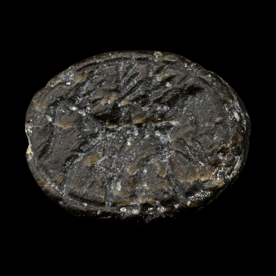 Western Asiatic Black Stone Scaraboid with Walking Horse