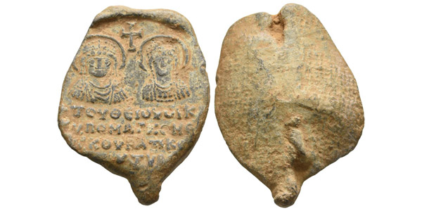 Byzantine Iconographic PB Seal in the name of Magnos, Kourator of the Divine House and Kommerkiarios of Theoupolis.