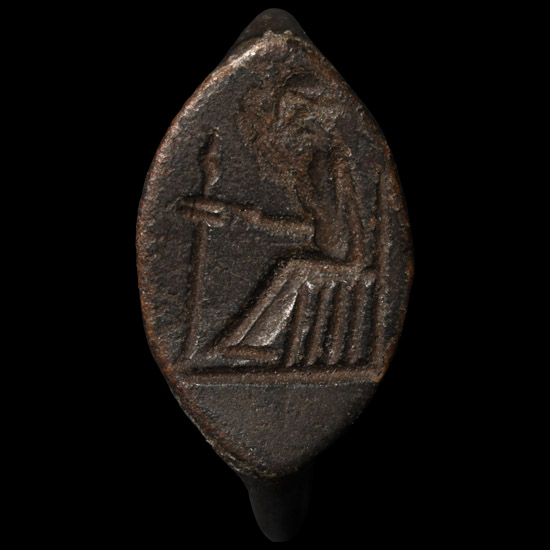 Large Greek Bronze Ring with Seated Figure