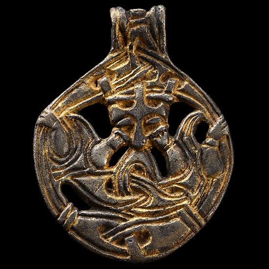 Viking Age Silver-Gilt Gripping Beast Pendant