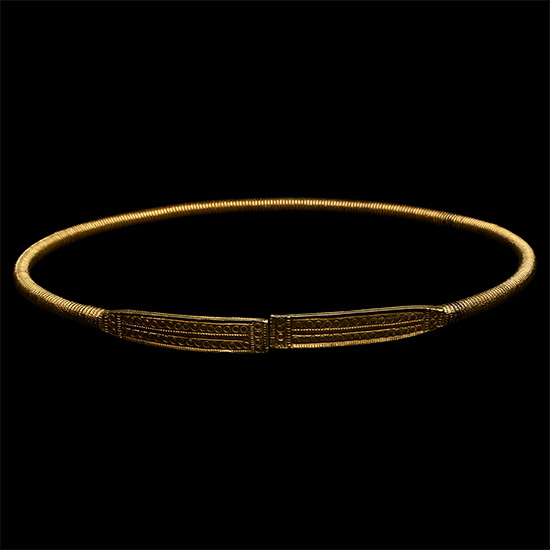 Scythian Gold-Clad Ribbed Torc with Decorated Terminals