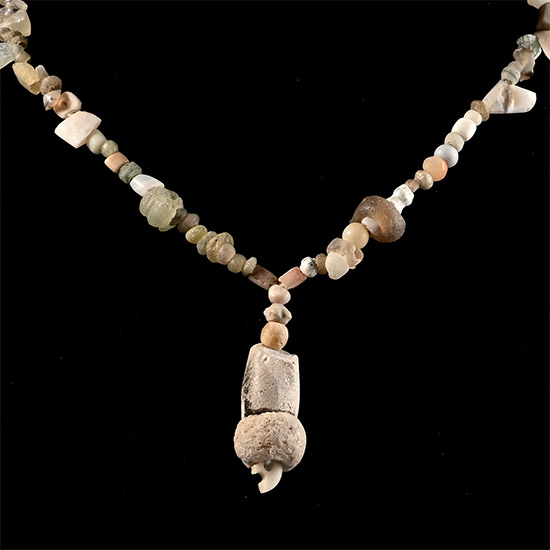 Western Asiatic Cream Glass and Other Bead Necklace String