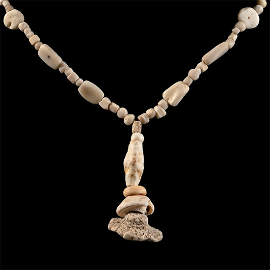 Western Asiatic Cream Glass and Other Bead Necklace String