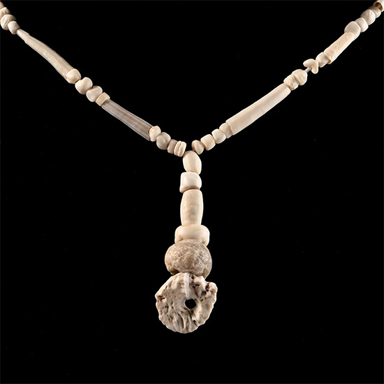 Western Asiatic Cream Glass and Other Bead Necklace String