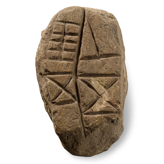 Stone Age Geometric Carvings on Limestone